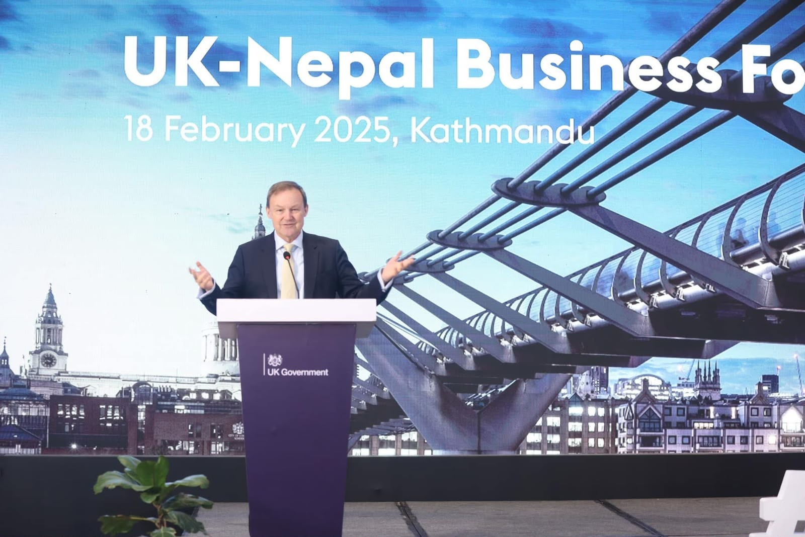 Speaker delivering opening remarks at the UK–Nepal Business Forum